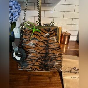 Patricia Nash Tiger Print collection. NWT. Kiss lock. Three straps. Dust bag